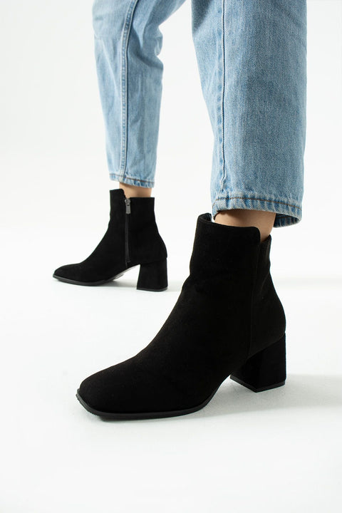 Siyah Deri Su Geçirmez Kadın Bot – Topuklu, Konforlu ve Sıcak Tutan Kışlık Model, Yeni Sezon